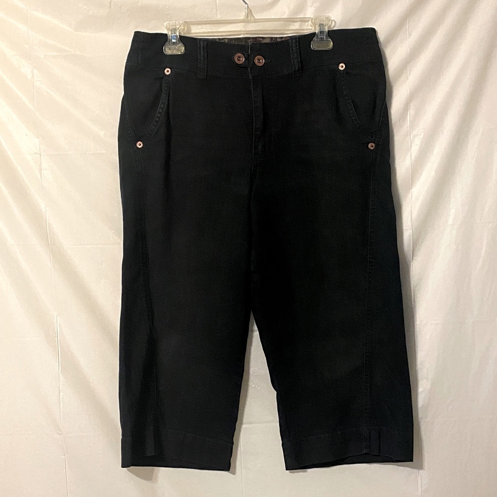Department of Peace dark blue Capri Pants. Made where side seams come forward.
